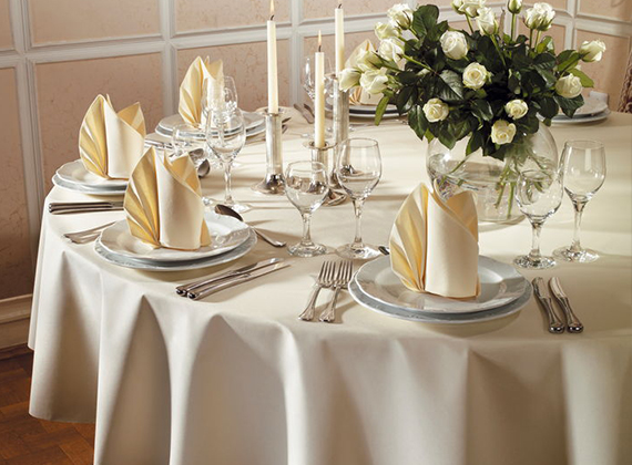 Cream Dunilin® napkins used for a wedding on a round table